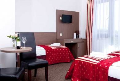 Zdjęcie pokoju z dwoma łóżkami